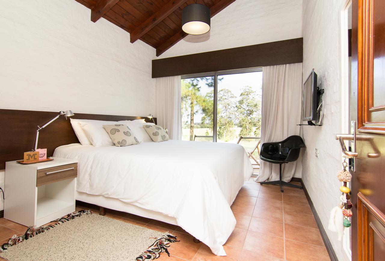 Posada Mosaico Villas Garzon Szoba fotó